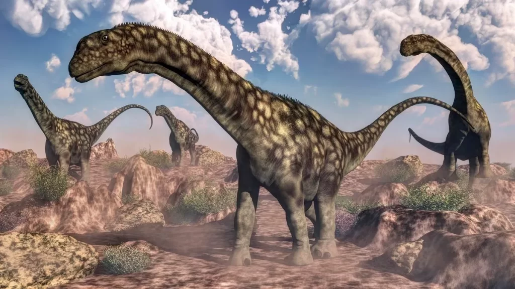 Argentinosaurus dinosaurs walking in the rocky desert
